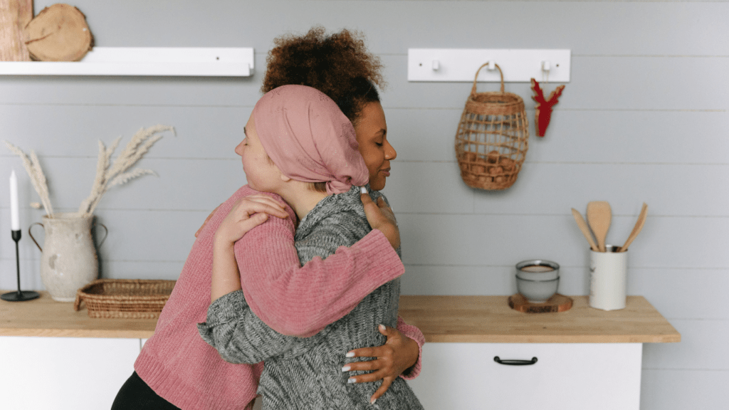 Two people hugging