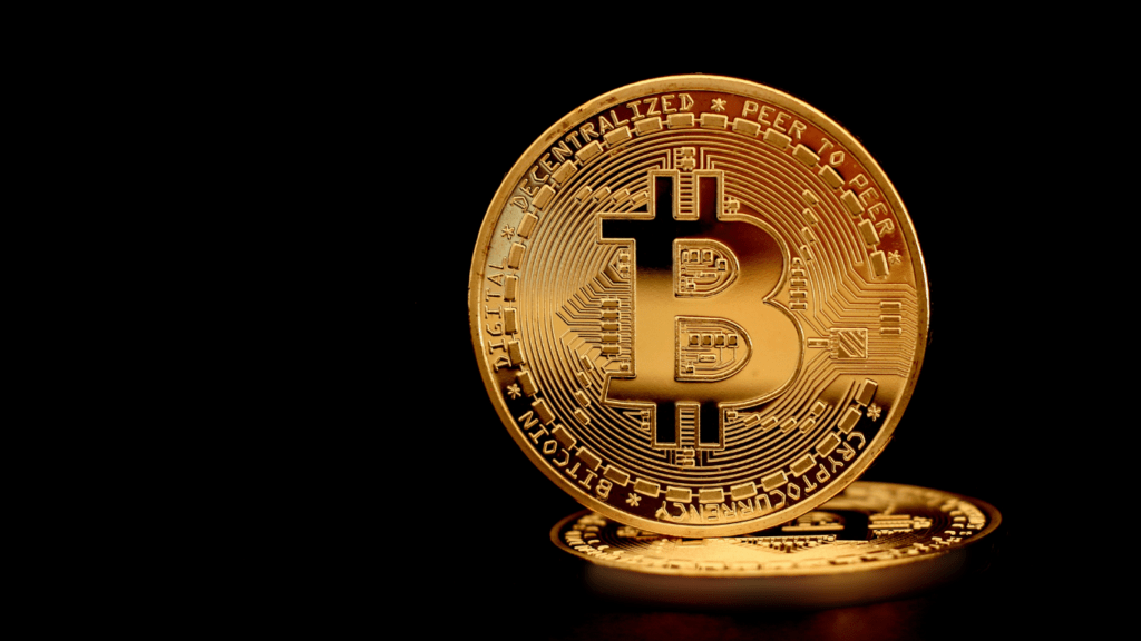 photograph of bitcoin against black background