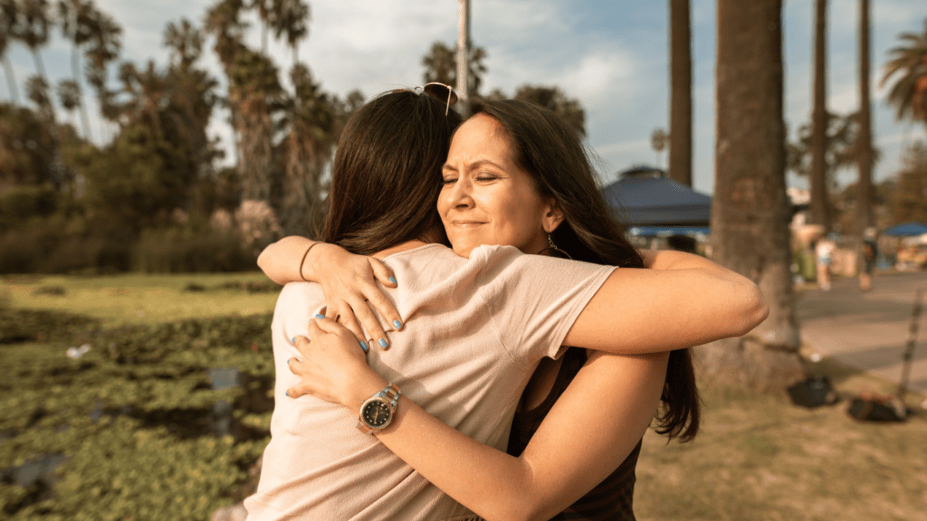 Two people hugging