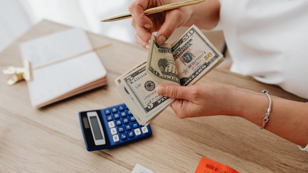 image of a person counting money